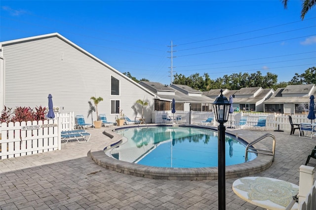 500 New York Ave Unit 23, Dunedin, FL 34698 - community pool with a patio