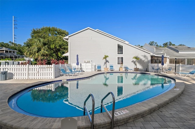 500 New York Ave Unit 23, Dunedin, FL 34698 - community pool with a patio