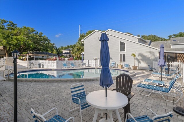 500 New York Ave Unit 23, Dunedin, FL 34698 - community pool with a patio