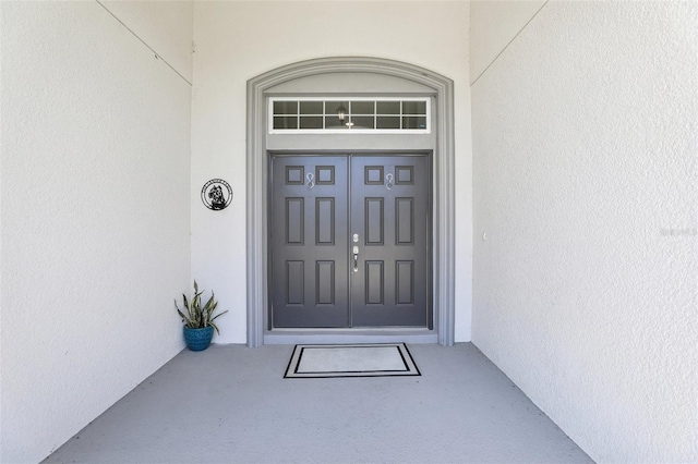229 St Thomas Dr, Mulberry, FL 33860 - entrance to property featuring stucco siding