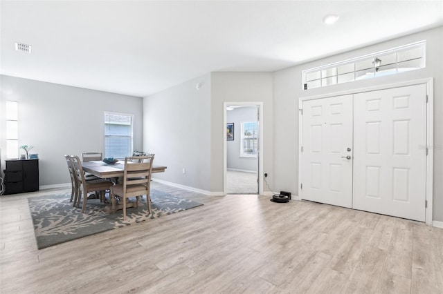 229 St Thomas Dr, Mulberry, FL 33860 - foyer featuring light wood finished floors and baseboards