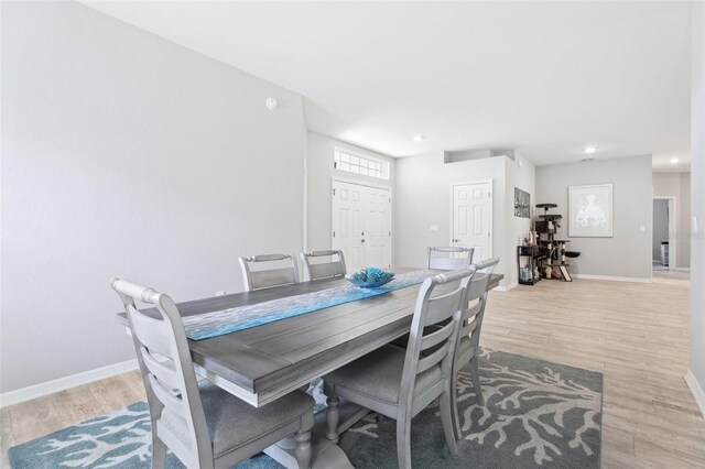 229 St Thomas Dr, Mulberry, FL 33860 - dining area featuring baseboards, light wood finished floors, and recessed lighting