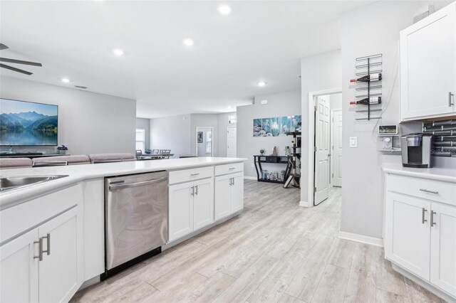 229 St Thomas Dr, Mulberry, FL 33860 - kitchen featuring stainless steel dishwasher, a ceiling fan, white cabinets, recessed lighting, and light wood finished floors
