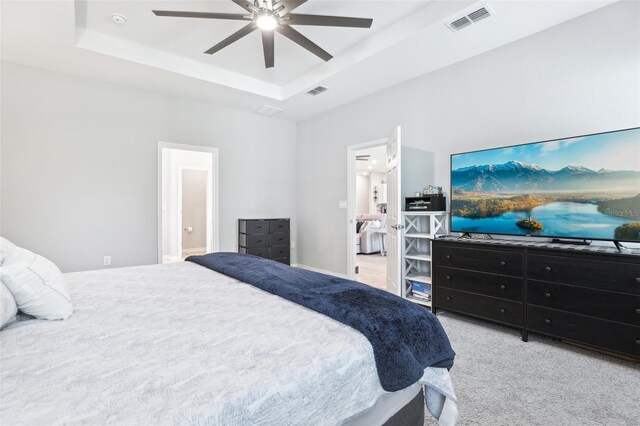 229 St Thomas Dr, Mulberry, FL 33860 - carpeted bedroom featuring a raised ceiling and ceiling fan