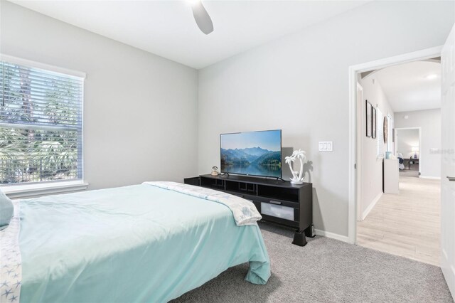 229 St Thomas Dr, Mulberry, FL 33860 - carpeted bedroom with ceiling fan and baseboards