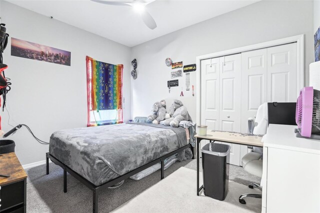 229 St Thomas Dr, Mulberry, FL 33860 - bedroom featuring carpet, a closet, a ceiling fan, baseboards, and a desk