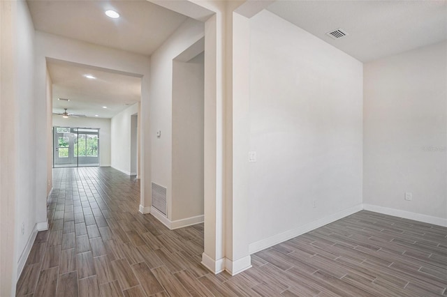 212 Shell Creek Ct, Apollo Beach, FL 33572 - hallway featuring wood finished floors, baseboards, and recessed lighting