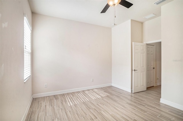 212 Shell Creek Ct, Apollo Beach, FL 33572 - empty room with ceiling fan, light wood-type flooring, and baseboards