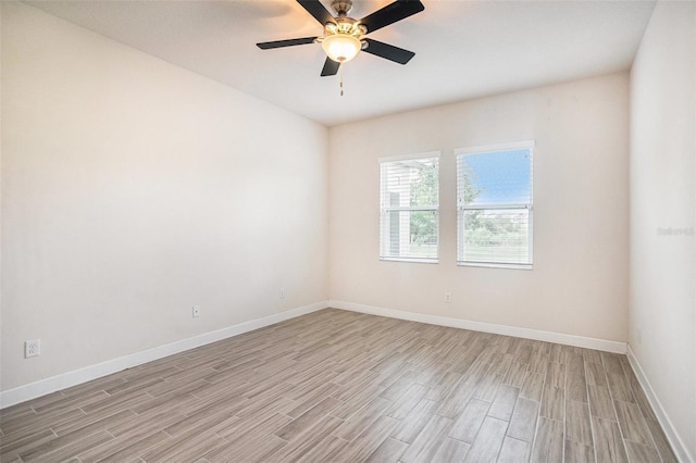 212 Shell Creek Ct, Apollo Beach, FL 33572 - empty room featuring light wood finished floors, baseboards, and a ceiling fan