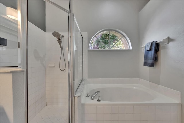 4418 River Overlook Dr, Valrico, FL 33596 - full bath featuring a stall shower and a garden tub