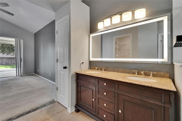 4418 River Overlook Dr, Valrico, FL 33596 - full bath with lofted ceiling, double vanity, tile patterned flooring, baseboards, and a closet