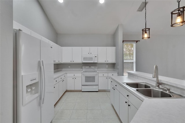 4418 River Overlook Dr, Valrico, FL 33596 - kitchen with white appliances, a sink, light countertops, hanging light fixtures, and recessed lighting