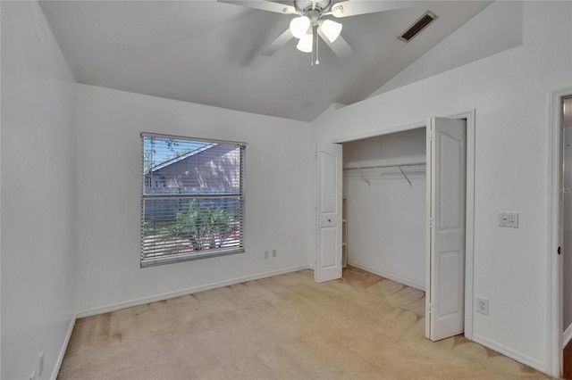 4418 River Overlook Dr, Valrico, FL 33596 - unfurnished bedroom with light colored carpet, lofted ceiling, a closet, a ceiling fan, and baseboards