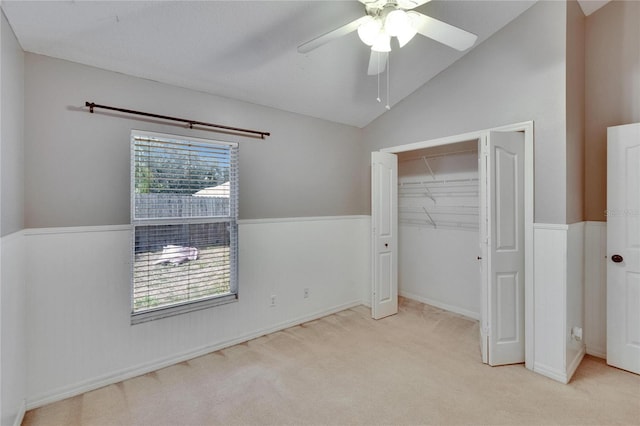 4418 River Overlook Dr, Valrico, FL 33596 - unfurnished bedroom featuring carpet floors, lofted ceiling, a closet, and a ceiling fan