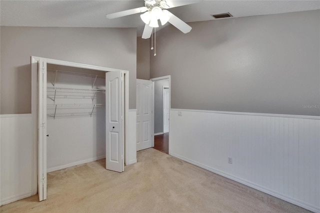 4418 River Overlook Dr, Valrico, FL 33596 - unfurnished bedroom with a closet, a wainscoted wall, carpet, and ceiling fan