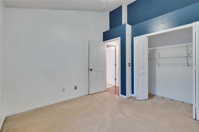 4418 River Overlook Dr, Valrico, FL 33596 - unfurnished bedroom with carpet floors, baseboards, a closet, and a high ceiling