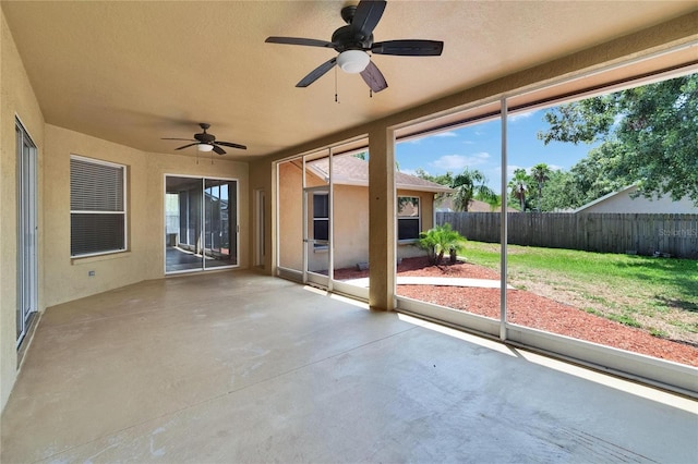 4418 River Overlook Dr, Valrico, FL 33596 - unfurnished sunroom featuring ceiling fan