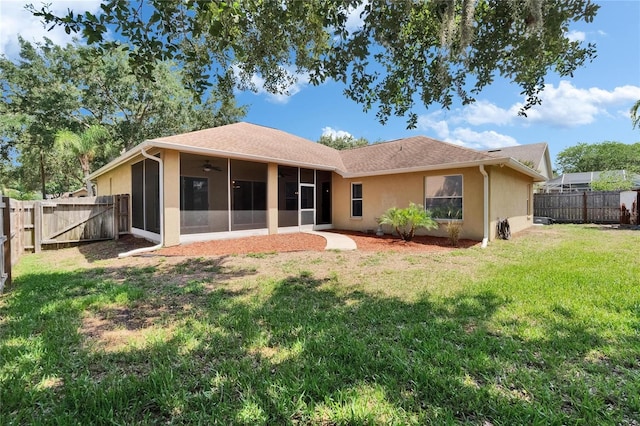 4418 River Overlook Dr, Valrico, FL 33596 - back of property with a sunroom, a gate, stucco siding, and ceiling fan