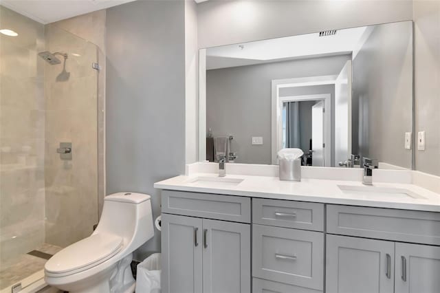1120 E Kennedy Blvd Unit 1512, Tampa, FL 33602 - full bathroom featuring a shower stall, double vanity, and toilet