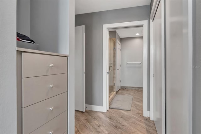 1120 E Kennedy Blvd Unit 1512, Tampa, FL 33602 - hallway with light wood-style flooring and baseboards