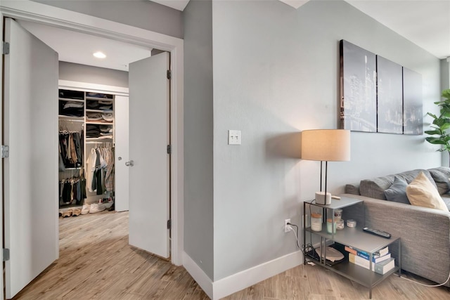 1120 E Kennedy Blvd Unit 1512, Tampa, FL 33602 - hallway with light wood finished floors and baseboards