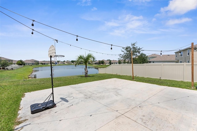 30936 Summer Sun Loop, Wesley Chapel, FL 33545 - view of patio / terrace featuring a water view and a residential view