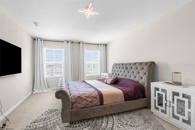 30936 Summer Sun Loop, Wesley Chapel, FL 33545 - bedroom with carpet flooring, a textured ceiling, and baseboards