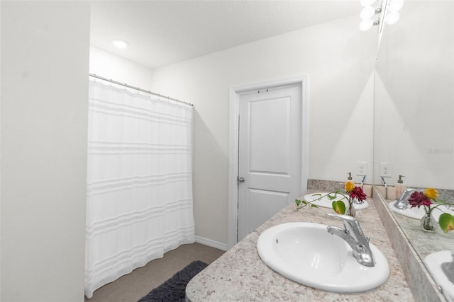 30936 Summer Sun Loop, Wesley Chapel, FL 33545 - full bath featuring vanity, a shower with shower curtain, and baseboards