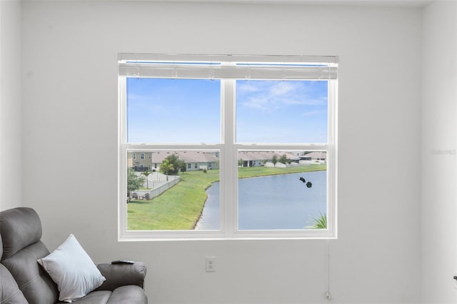 30936 Summer Sun Loop, Wesley Chapel, FL 33545 - living area with healthy amount of natural light and a water view