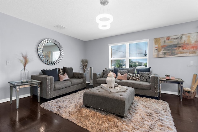 30936 Summer Sun Loop, Wesley Chapel, FL 33545 - living room featuring dark wood-type flooring and baseboards