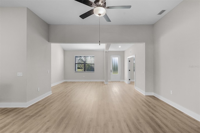 2402 Hiers Rd, Dover, FL 33527 - unfurnished room featuring a ceiling fan, light wood-style floors, and baseboards