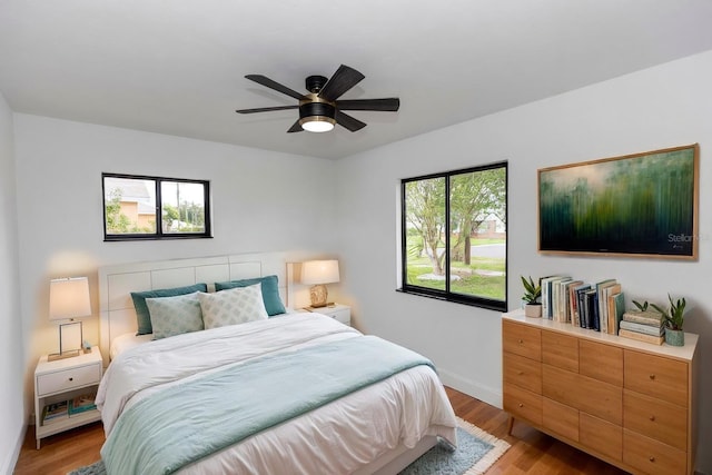 1161 Orangewood Ave, Deland, FL 32724 - bedroom featuring light wood-style floors, baseboards, and ceiling fan