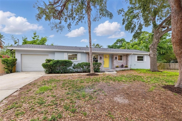 1470 Serpentine Dr S, Saint Petersburg, FL 33705 - ranch-style house with an attached garage, driveway, and stucco siding