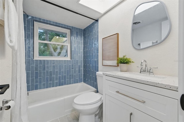 1470 Serpentine Dr S, Saint Petersburg, FL 33705 - full bathroom featuring shower / bath combination with curtain, toilet, vanity, and a skylight