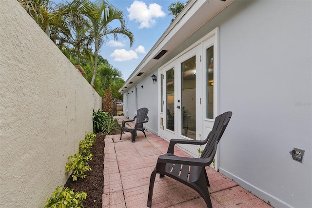 1470 Serpentine Dr S, Saint Petersburg, FL 33705 - view of patio / terrace featuring french doors