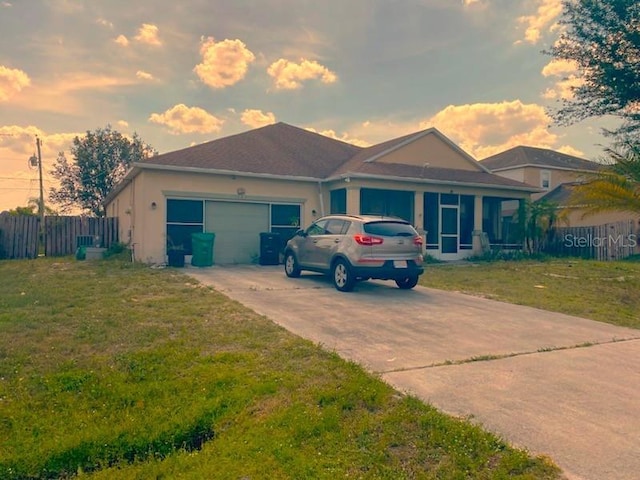 1720 SW Cameo Blvd, Port St Lucie, FL 34953 - ranch-style house featuring driveway, an attached garage, and stucco siding