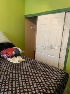 1720 SW Cameo Blvd, Port St Lucie, FL 34953 - bedroom featuring a closet
