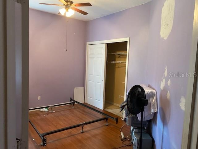 1720 SW Cameo Blvd, Port St Lucie, FL 34953 - bedroom with wood finished floors