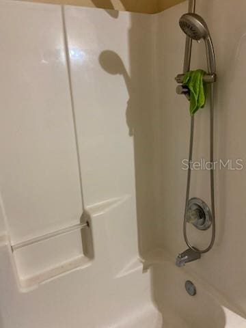 1720 SW Cameo Blvd, Port St Lucie, FL 34953 - bathroom featuring shower / bath combination