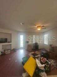 1720 SW Cameo Blvd, Port St Lucie, FL 34953 - living room featuring ceiling fan and wood finished floors