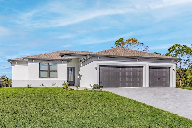 2414 Hiers Rd, Dover, FL 33527 - view of front of house with an attached garage, decorative driveway, a front lawn, and stucco siding
