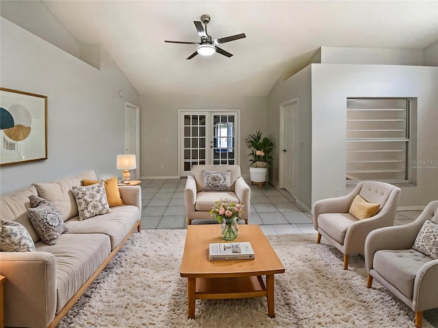8812 Bayaud Dr, Tampa, FL 33626 - living room featuring vaulted ceiling, a ceiling fan, light tile patterned flooring, and baseboards