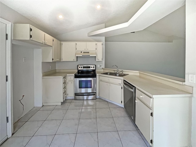 8812 Bayaud Dr, Tampa, FL 33626 - kitchen featuring appliances with stainless steel finishes, a sink, under cabinet range hood, lofted ceiling, and light countertops