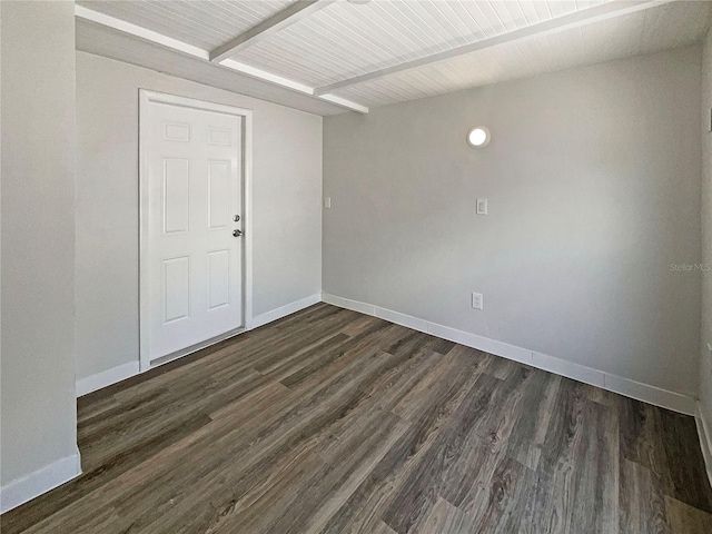 8812 Bayaud Dr, Tampa, FL 33626 - empty room with beam ceiling, baseboards, and dark wood-style floors