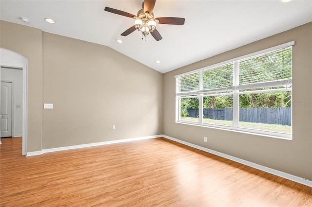 12746 Standbridge Dr, Riverview, FL 33579 - empty room featuring healthy amount of natural light, light wood-style flooring, lofted ceiling, and recessed lighting