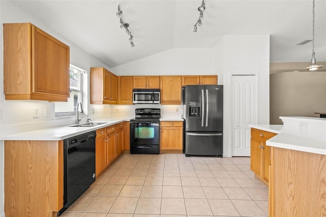 12746 Standbridge Dr, Riverview, FL 33579 - kitchen with black appliances, rail lighting, a sink, vaulted ceiling, and light tile patterned flooring