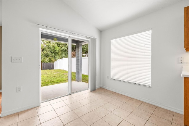 12746 Standbridge Dr, Riverview, FL 33579 - unfurnished room featuring vaulted ceiling, baseboards, and light tile patterned floors