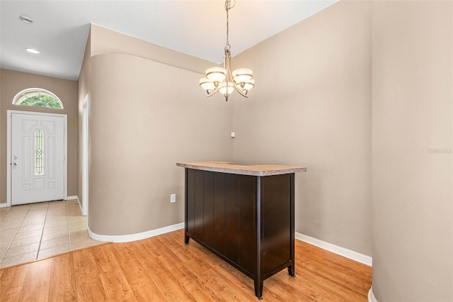 12746 Standbridge Dr, Riverview, FL 33579 - entryway with a chandelier, baseboards, light wood-type flooring, and recessed lighting