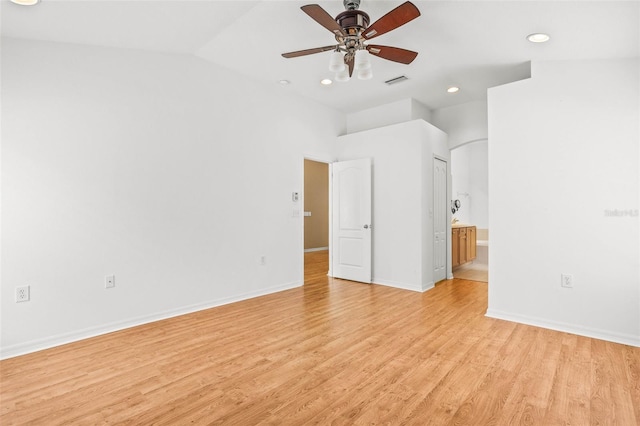 12746 Standbridge Dr, Riverview, FL 33579 - unfurnished bedroom featuring light wood-style flooring, baseboards, recessed lighting, ensuite bath, and vaulted ceiling