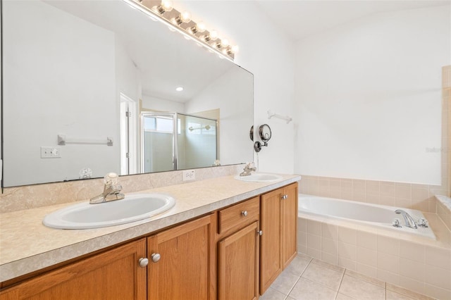 12746 Standbridge Dr, Riverview, FL 33579 - bathroom featuring double vanity, tile patterned flooring, a shower stall, and a bath